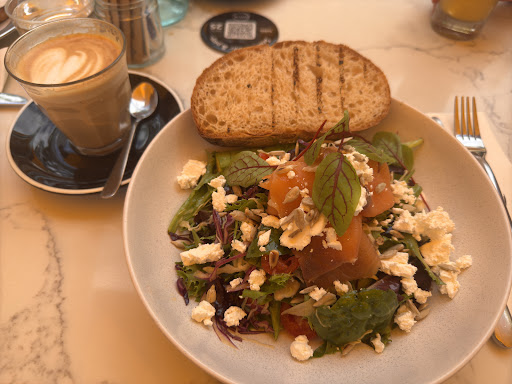 Salad, toast, coffee, and juice at Shuk